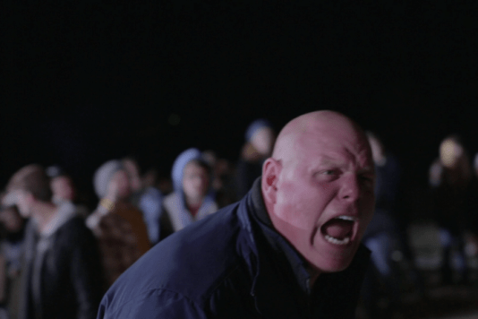 Closer-God-protestor-yelling-700x467