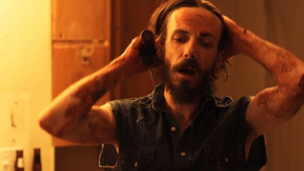 red-white-and-blue-movie-blood-vest-flag-noah-taylor